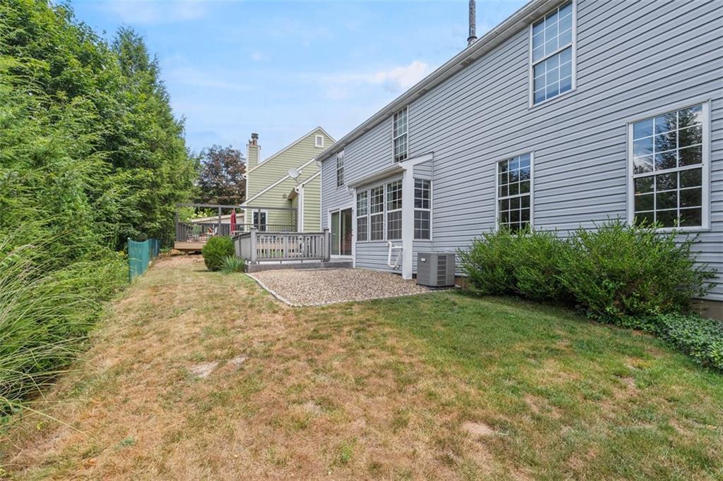 2582 Grouse Ridge, Unit A Wexford, PA 15090 - Photo 36 of 44 The level yard gives some room to run.