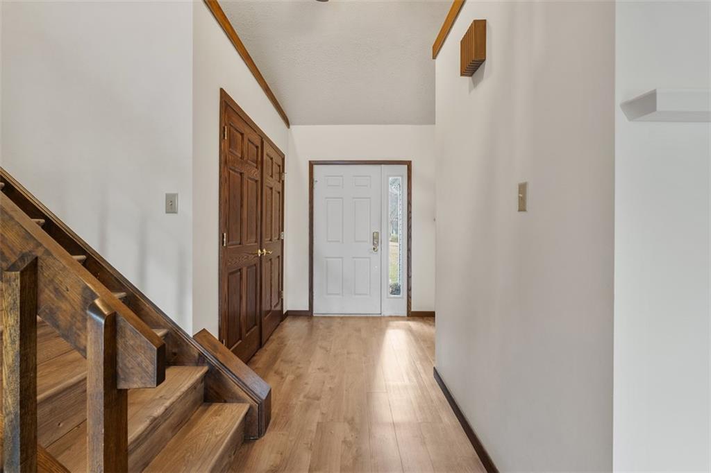 2582 Grouse Ridge, Unit A Wexford, PA 15090 - Photo 4 of 44 Light and bright, the entry boats 14 ft ceilings and double door coat closet.