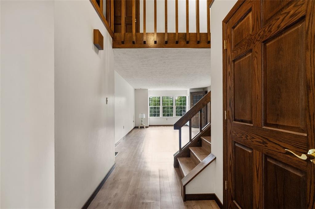 2582 Grouse Ridge, Unit A Wexford, PA 15090 - Photo 5 of 44 Sightlines to the backyard greet you as you enter the home.