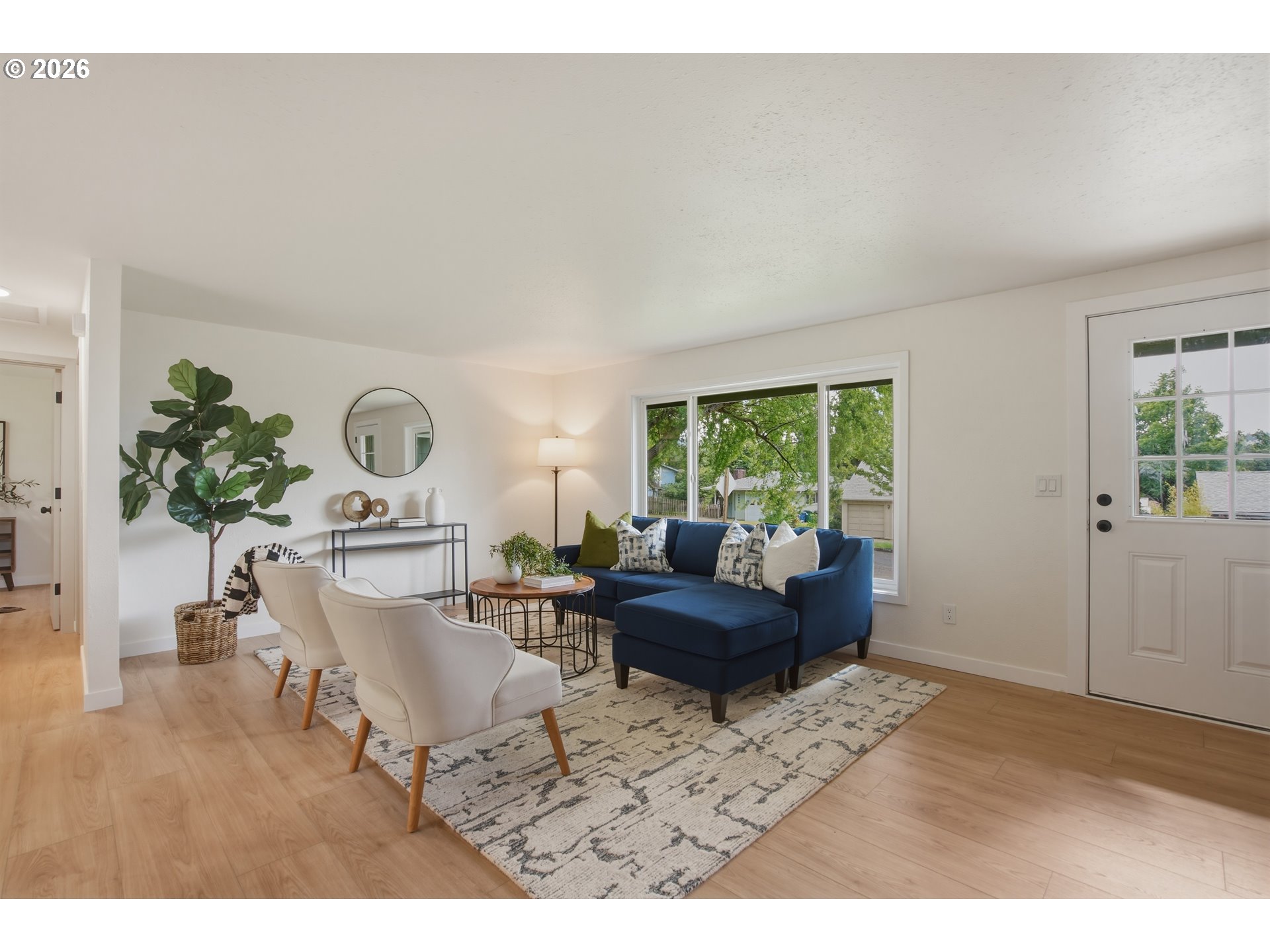 3455 Potter Street Eugene, OR 97405 - Photo 6 of 36 a living room with furniture and a window