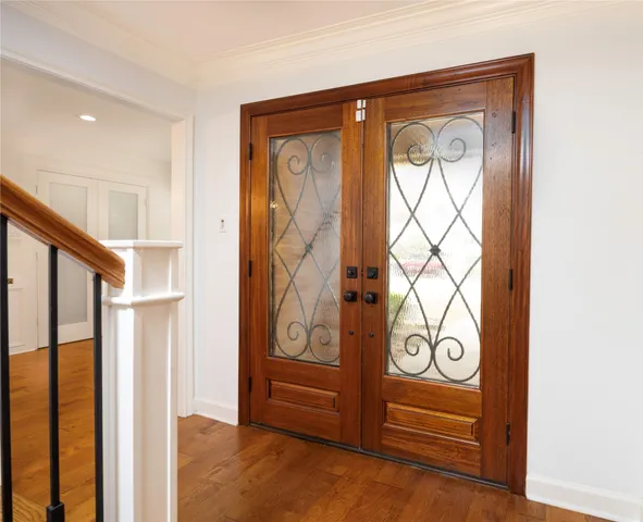 a view of front door with yellow walls