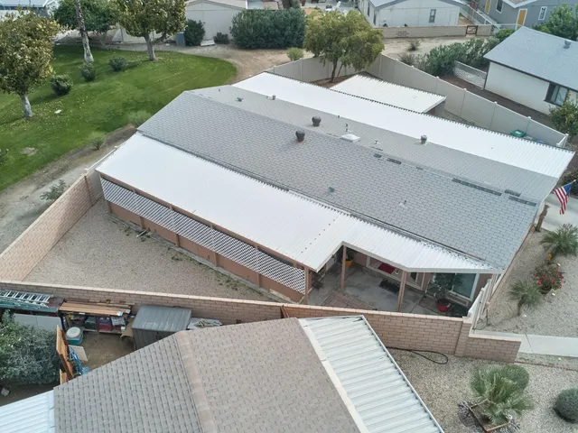 an aerial view of a city with lots of residential buildings