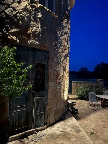 a backyard of a house with lots of green space