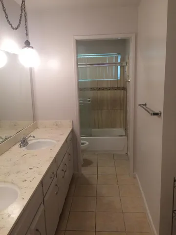 a kitchen with a stove and a sink