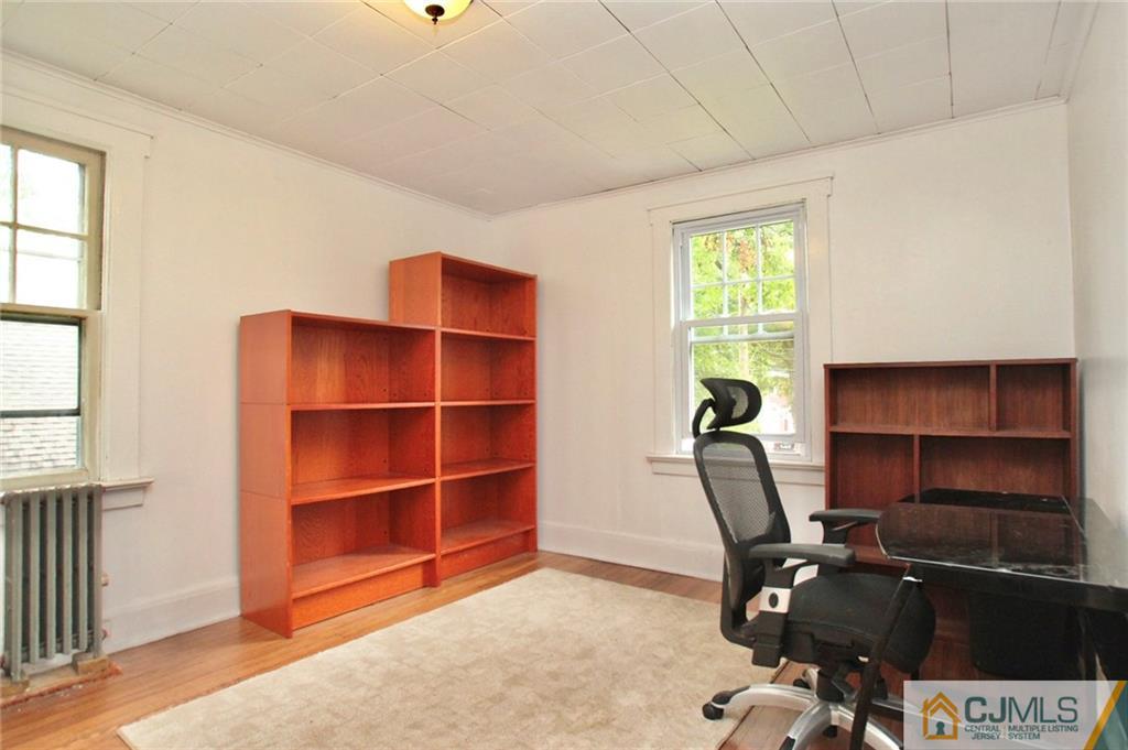 117 Russell Road Fanwood, NJ 07023 - Photo 13 of 22 a view of a workspace with furniture and a window