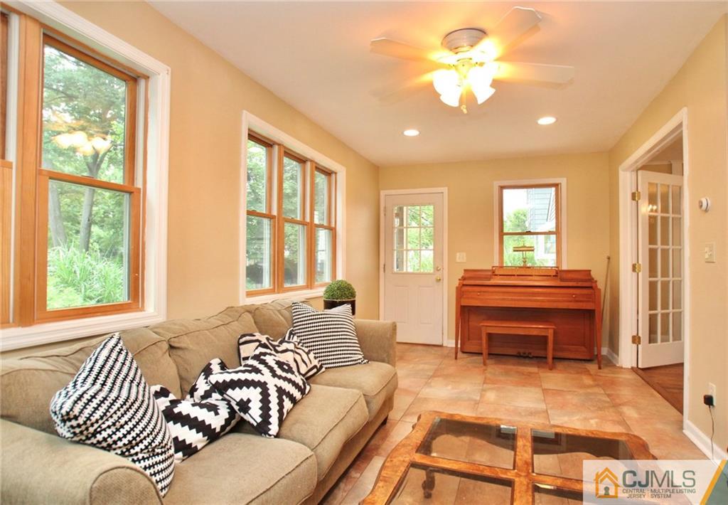 117 Russell Road Fanwood, NJ 07023 - Photo 9 of 22 a bedroom with a bed and wooden floor