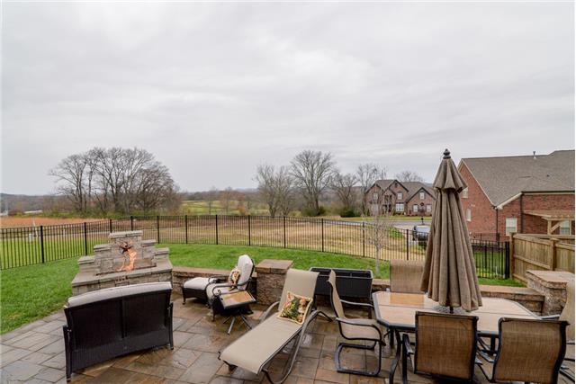168 Circuit Road Franklin, TN 37064 - Photo 16 of 20 This lovely home has a large stone patio, ideal for entertaining or relaxing, including gas line for grill and gas line for fireplace. Excellent views of rolling hills and sunsets.