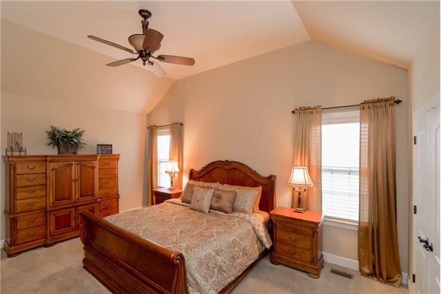 168 Circuit Road Franklin, TN 37064 - Photo 8 of 20 The master bedroom is located on the main level and features vaulted ceiling, ceiling fan, 2 inch blinds and 2 walk-in closets.