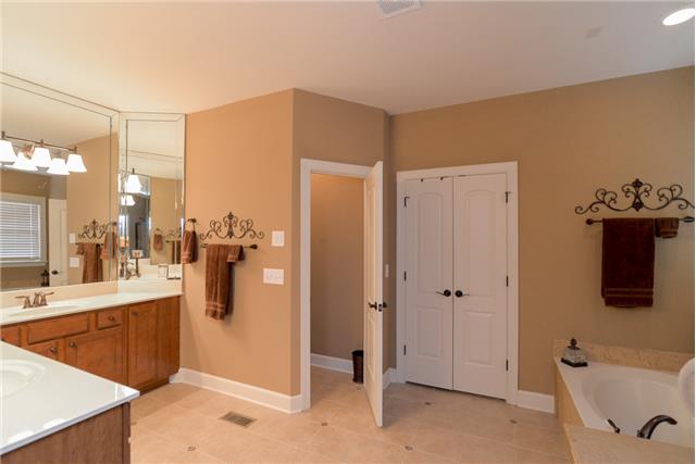 168 Circuit Road Franklin, TN 37064 - Photo 9 of 20 The master bath features tile floors, separate vanity areas, private water closet, separate shower and tub. All plumbing fixtures and accessories are oil rubbed bronze. This is a beautiful master bath.
