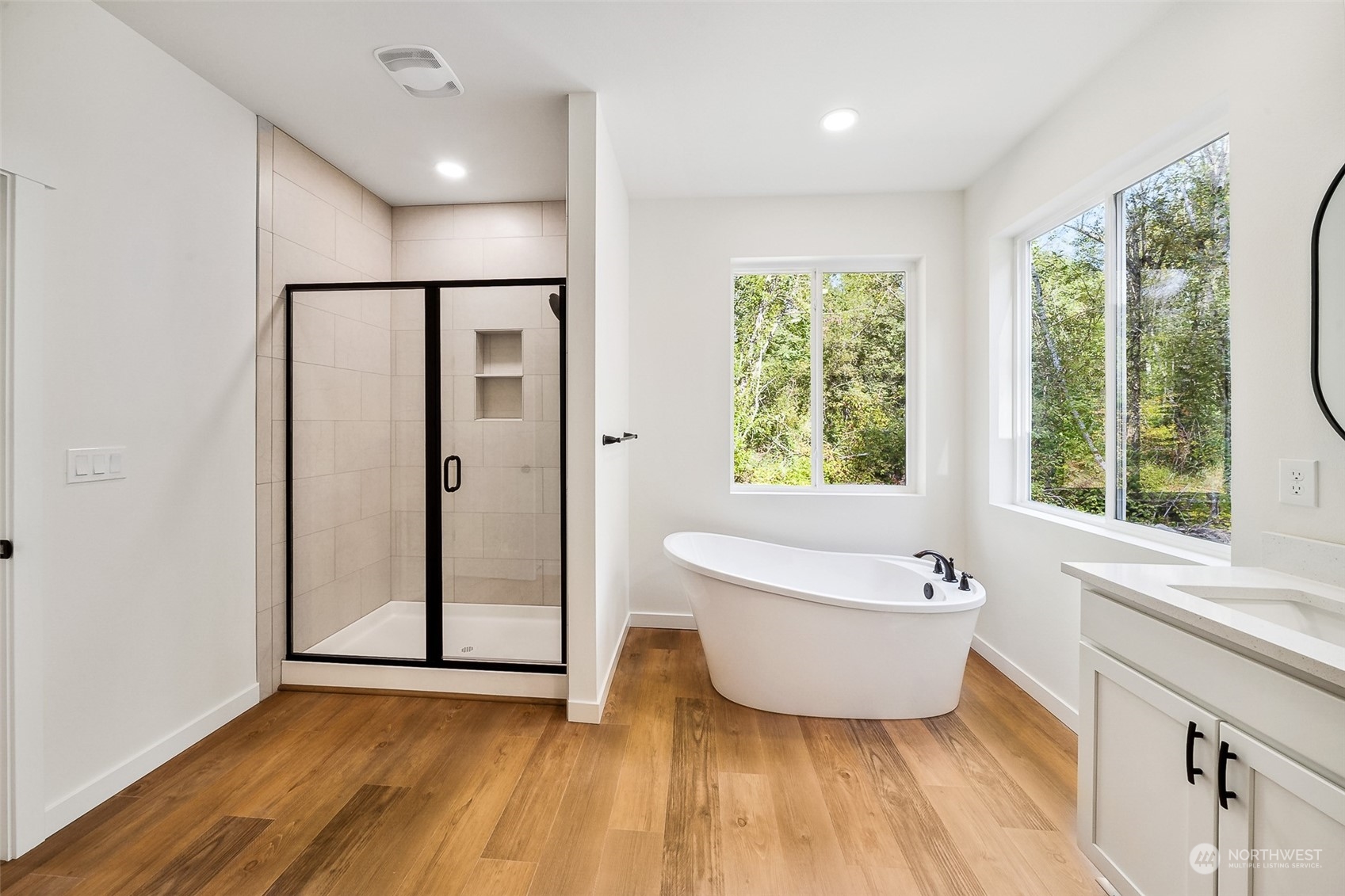 27117 Entwhistle Road East Buckley, WA 98321 - Photo 18 of 40 a bathroom with a bathtub and a shower