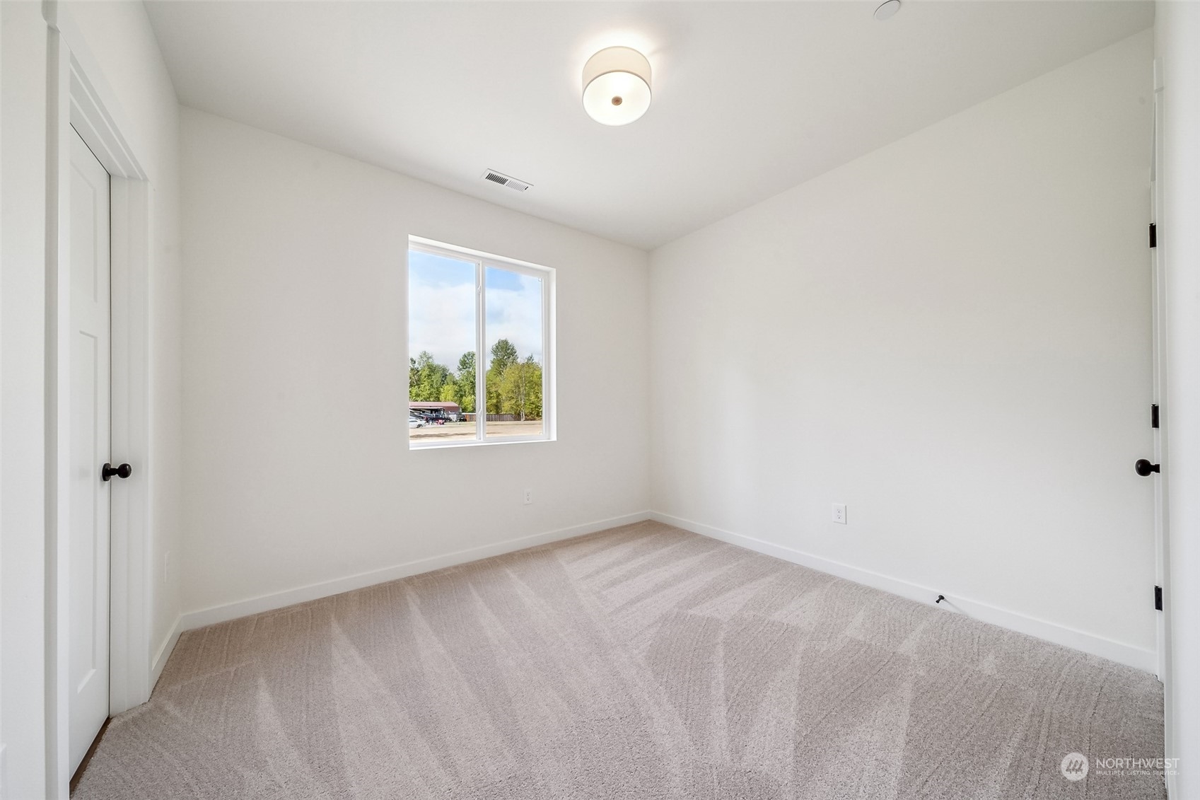27117 Entwhistle Road East Buckley, WA 98321 - Photo 25 of 40 an empty room with windows