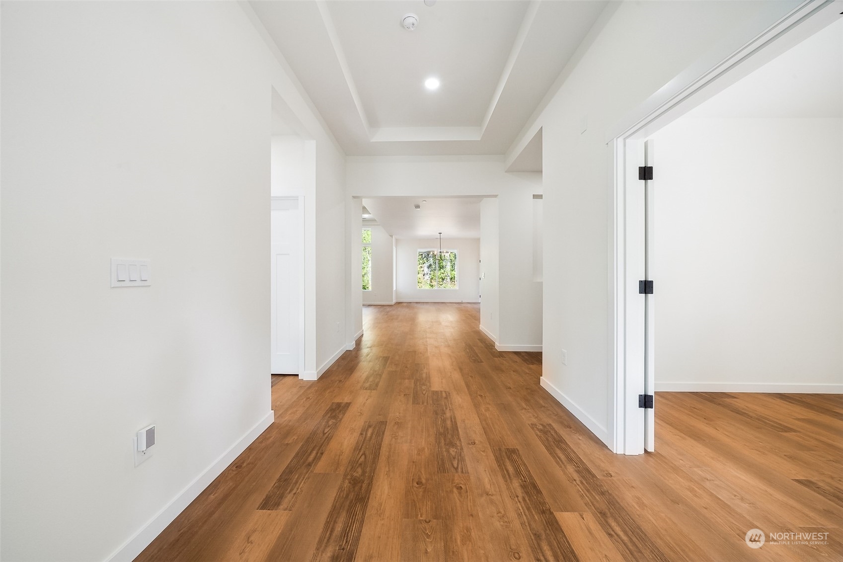 27117 Entwhistle Road East Buckley, WA 98321 - Photo 8 of 40 a view of a hallway with wooden floor