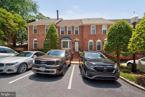 a car parked in front of a house