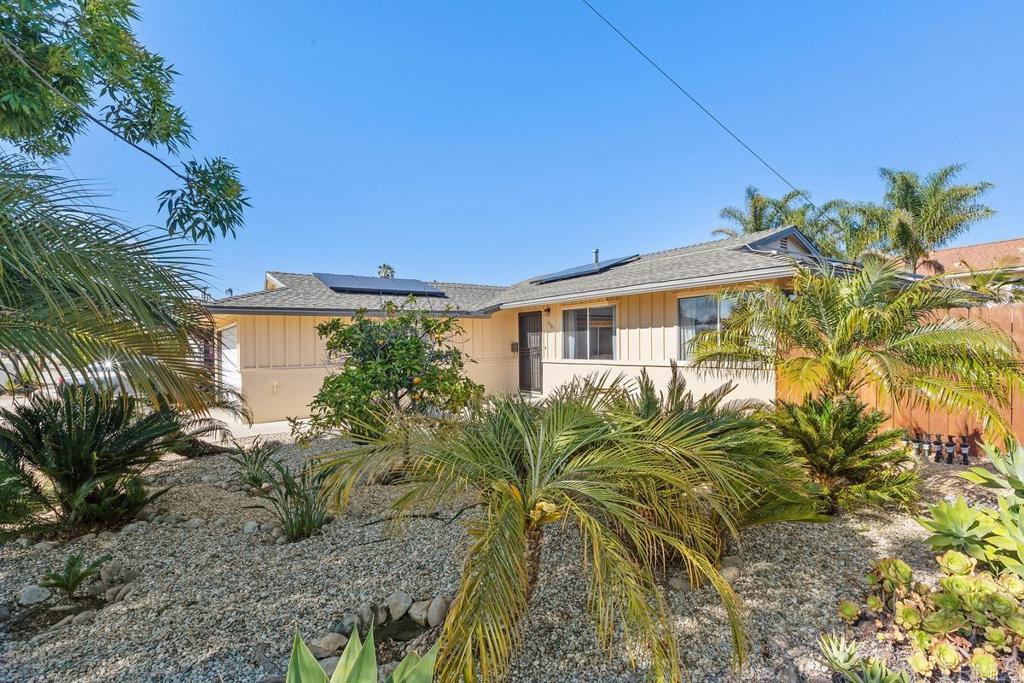 4501 Rolfe Road San Diego, CA 92117 - Photo 1 of 1 a view of a house with a yard