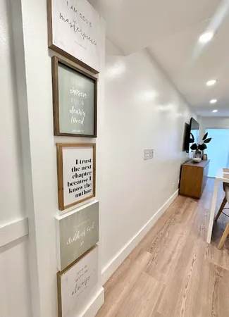 a view of a lake with a lawn chairs