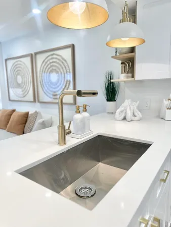 a bedroom with a bed and a lamp