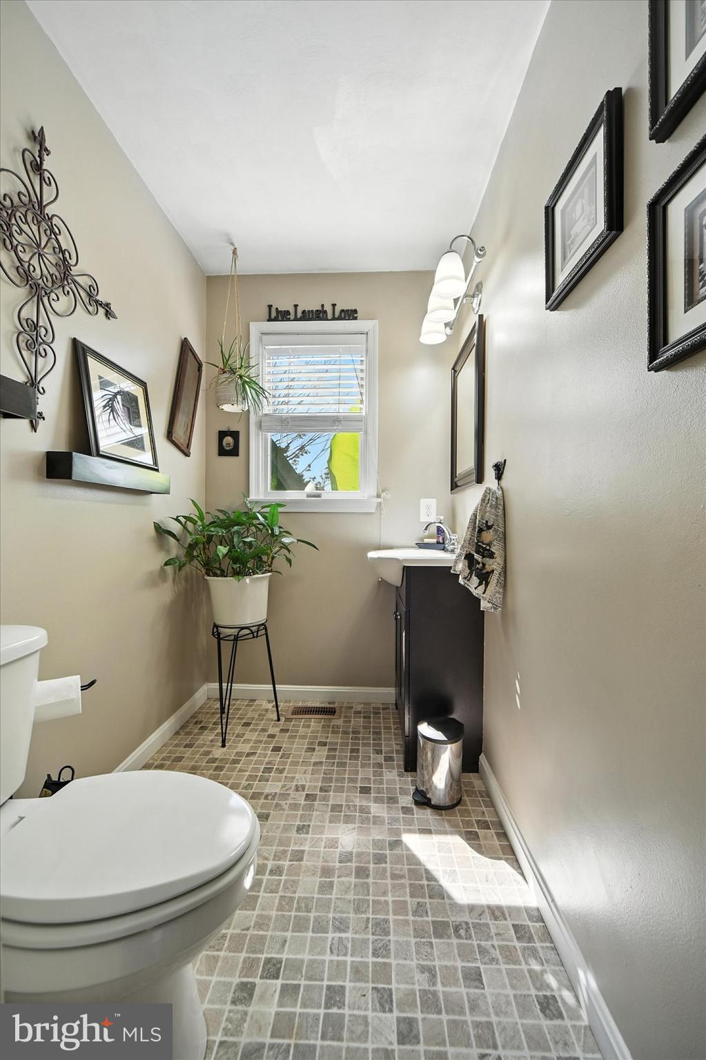 1485 Bachmans Valley Road Westminster, MD 21158 - Photo 18 of 60 a bathroom with a toilet a sink and mirror