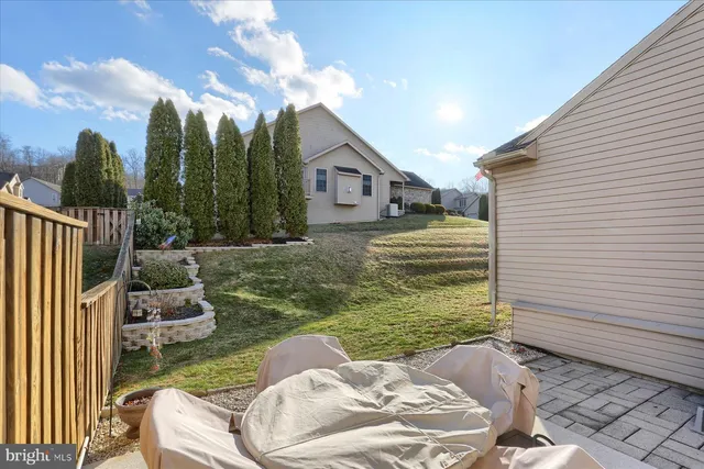 a house with swimming pool in front of it
