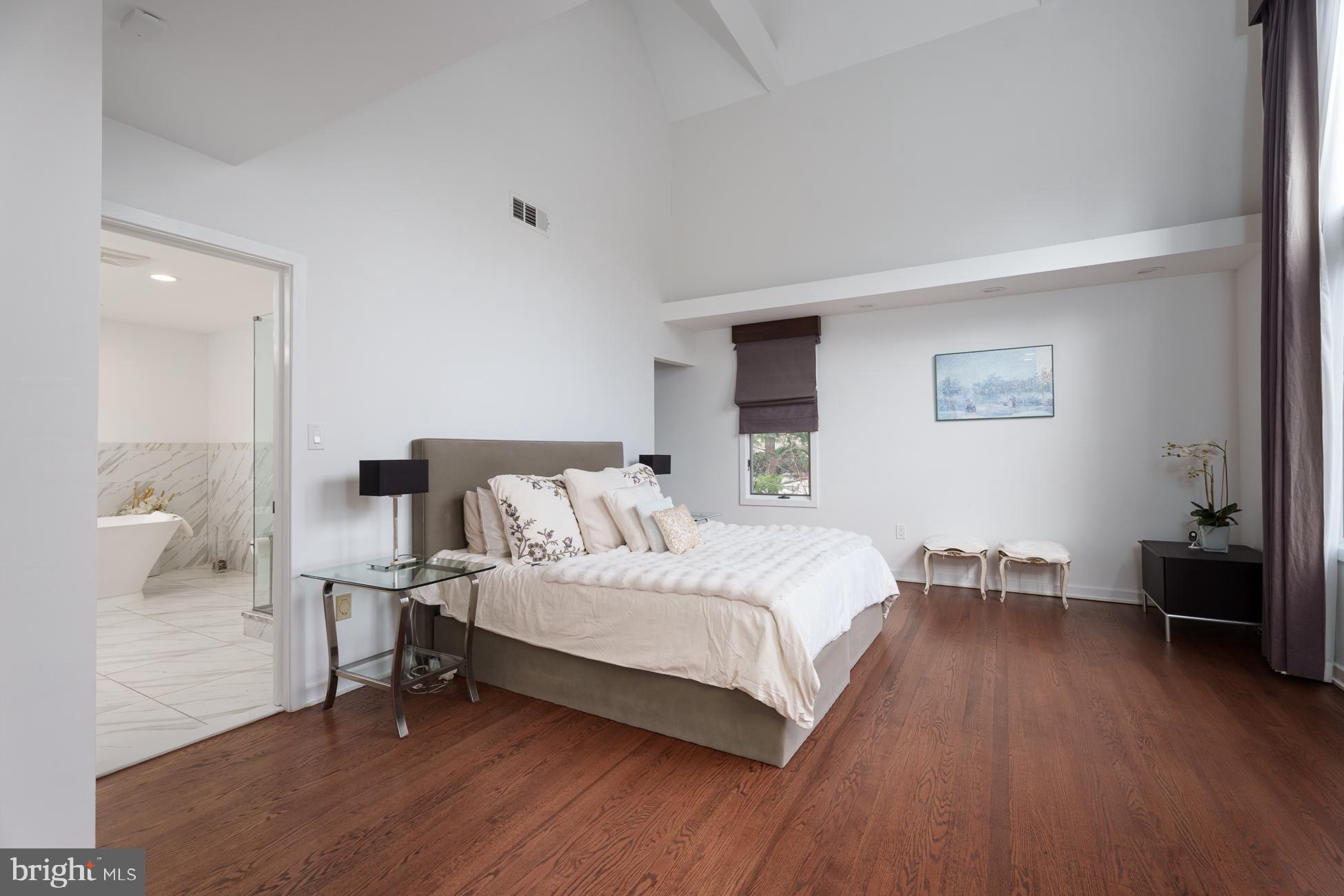 6 Andrews Lane Princeton, NJ 08540 - Photo 15 of 27 a bedroom with a bed and a table in it