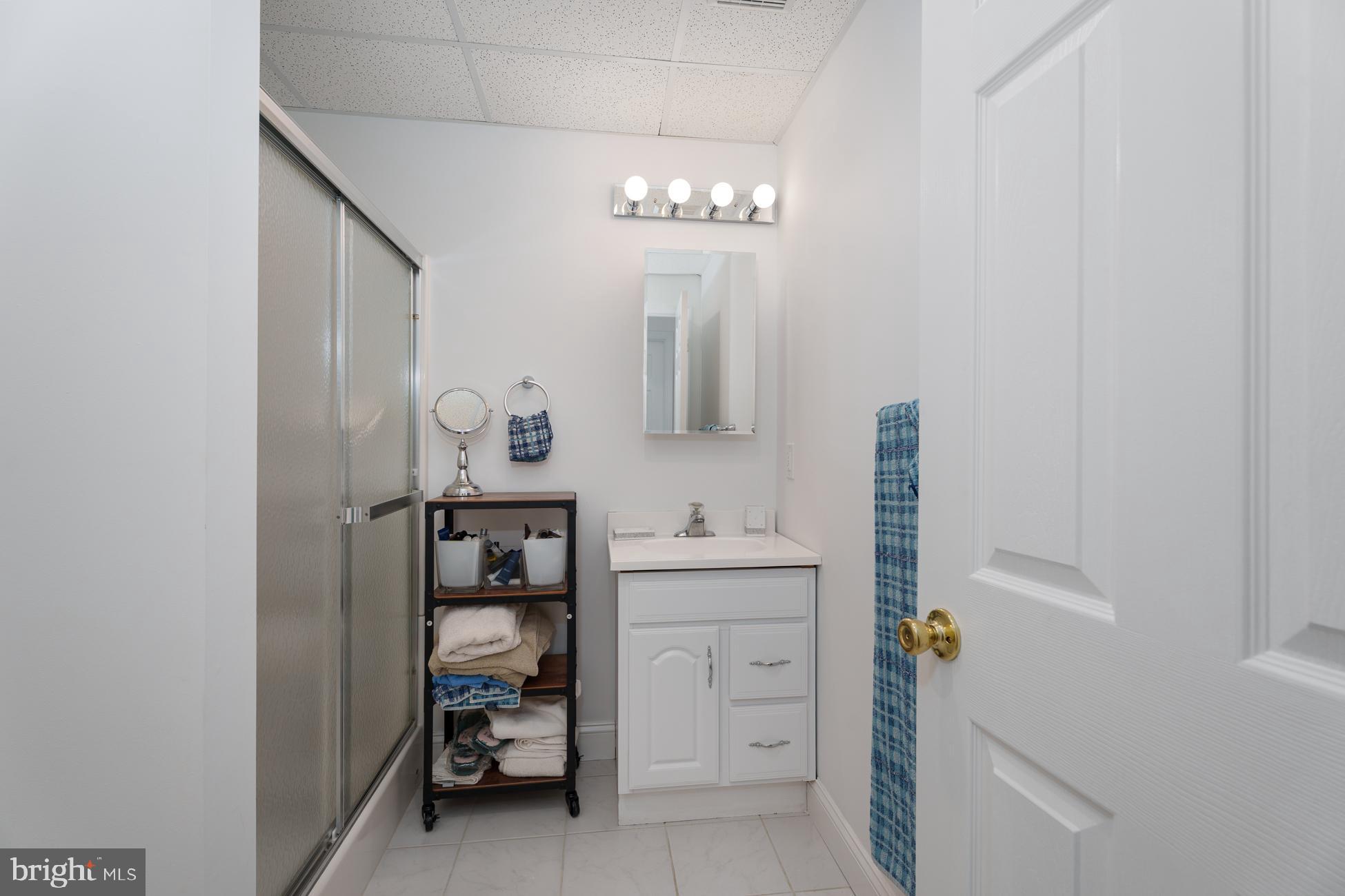 6 Andrews Lane Princeton, NJ 08540 - Photo 24 of 27 a bathroom with a sink a vanity and mirror