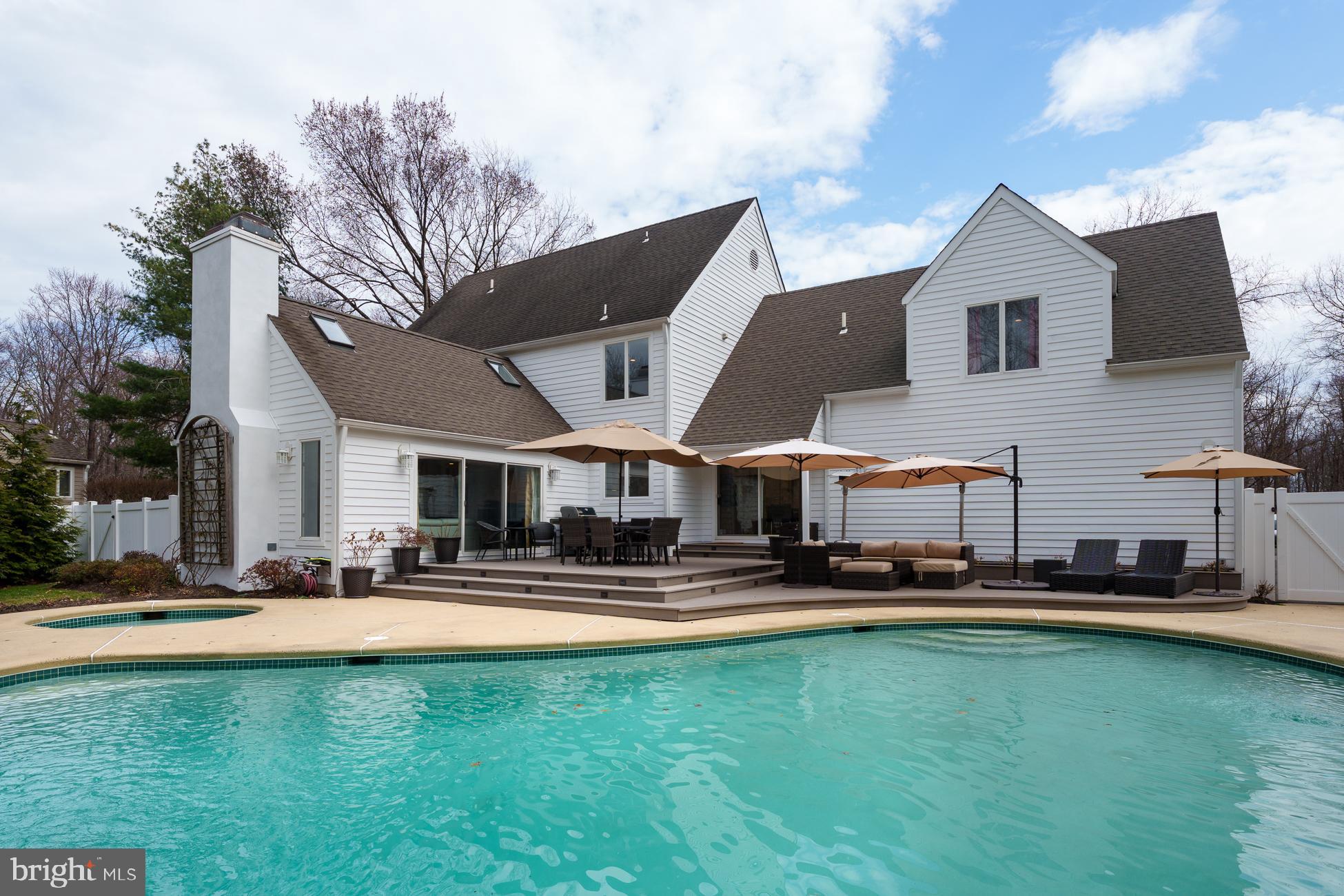 6 Andrews Lane Princeton, NJ 08540 - Photo 27 of 27 a front view of a building with swimming pool and chairs