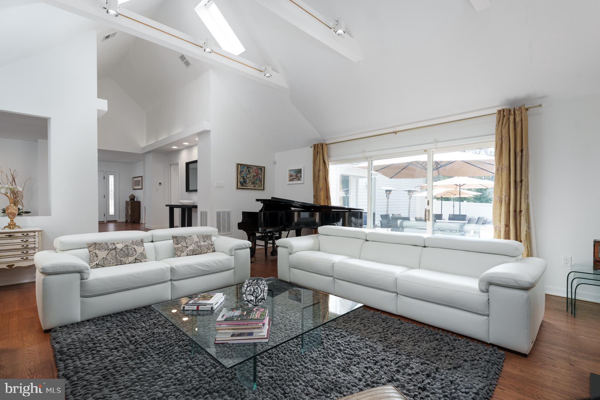 6 Andrews Lane Princeton, NJ 08540 - Photo 5 of 27 a living room with furniture wooden floor and a large window