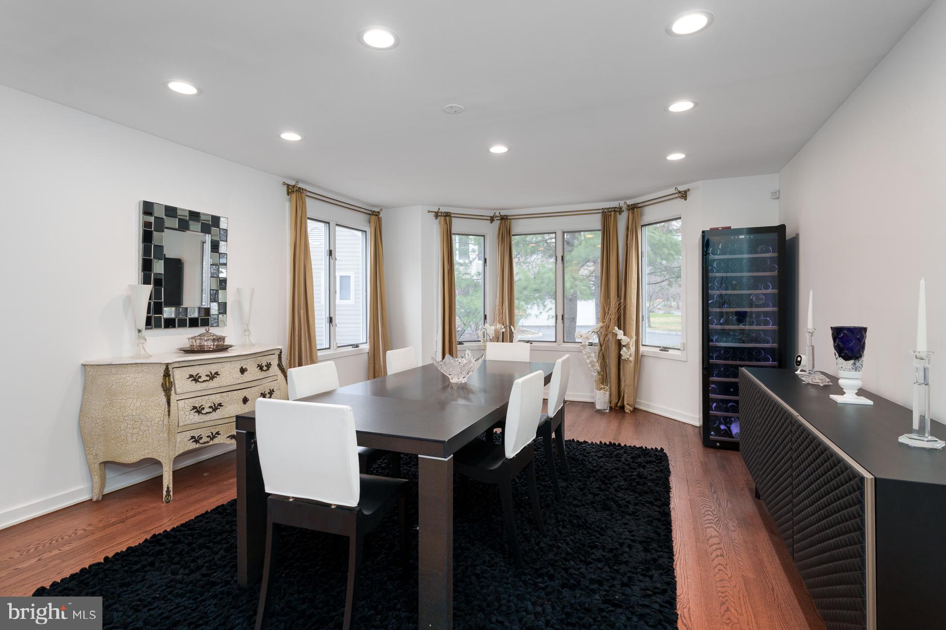 6 Andrews Lane Princeton, NJ 08540 - Photo 6 of 27 a kitchen with a table chairs sink and cabinets
