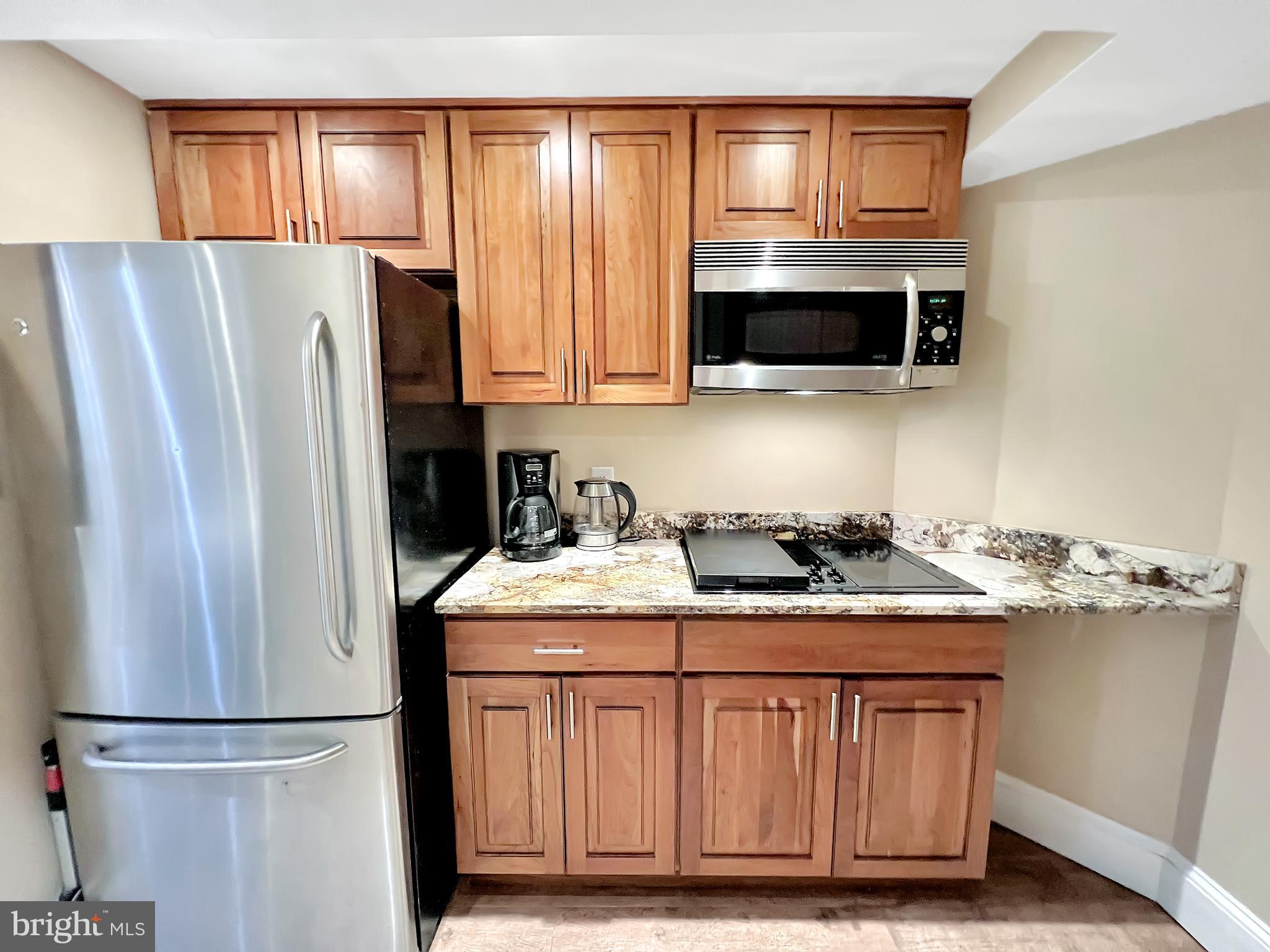 Kitchen w/ Stainless Steel Appliances