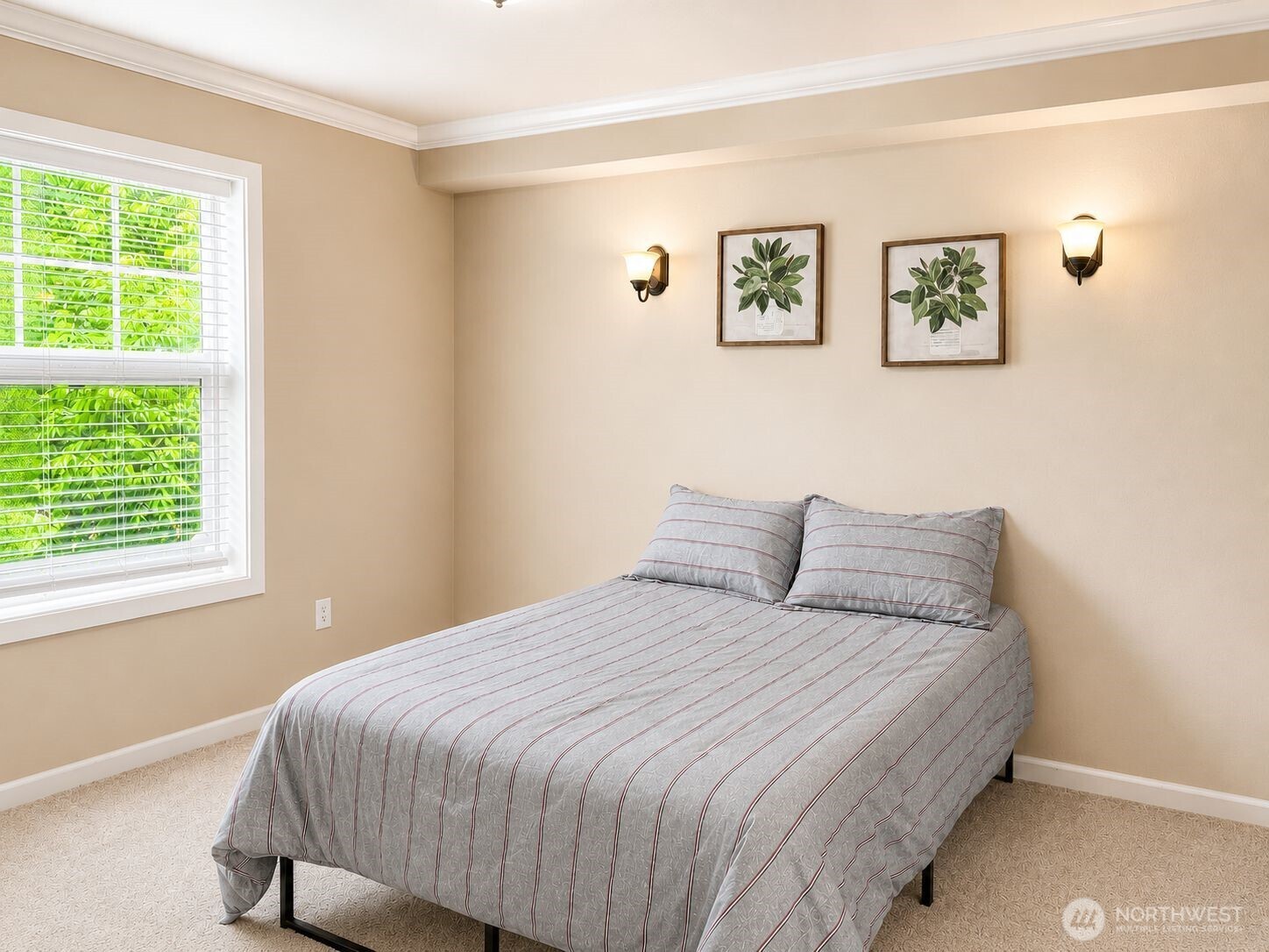 700 32nd Street, Unit A309 Bellingham, WA 98225 - Photo 15 of 28 a bedroom with a bed and painting on the wall