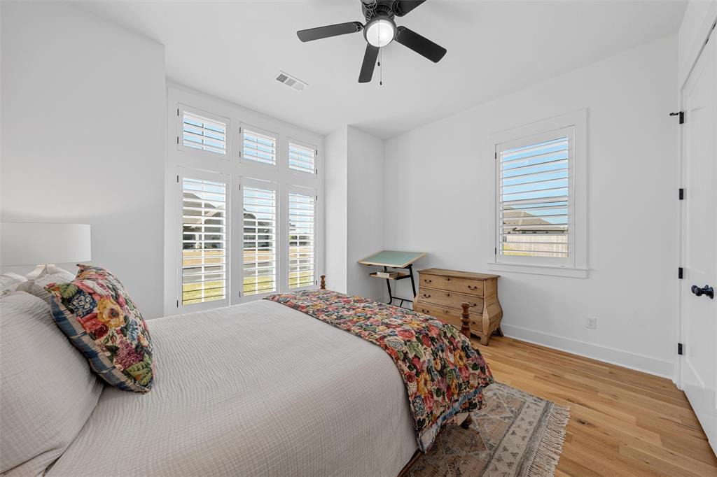 216 Wycliff Drive China Spring, TX 76633 - Photo 22 of 40 a bed sitting in a bedroom next to a window
