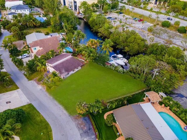an aerial view of a house with a garden