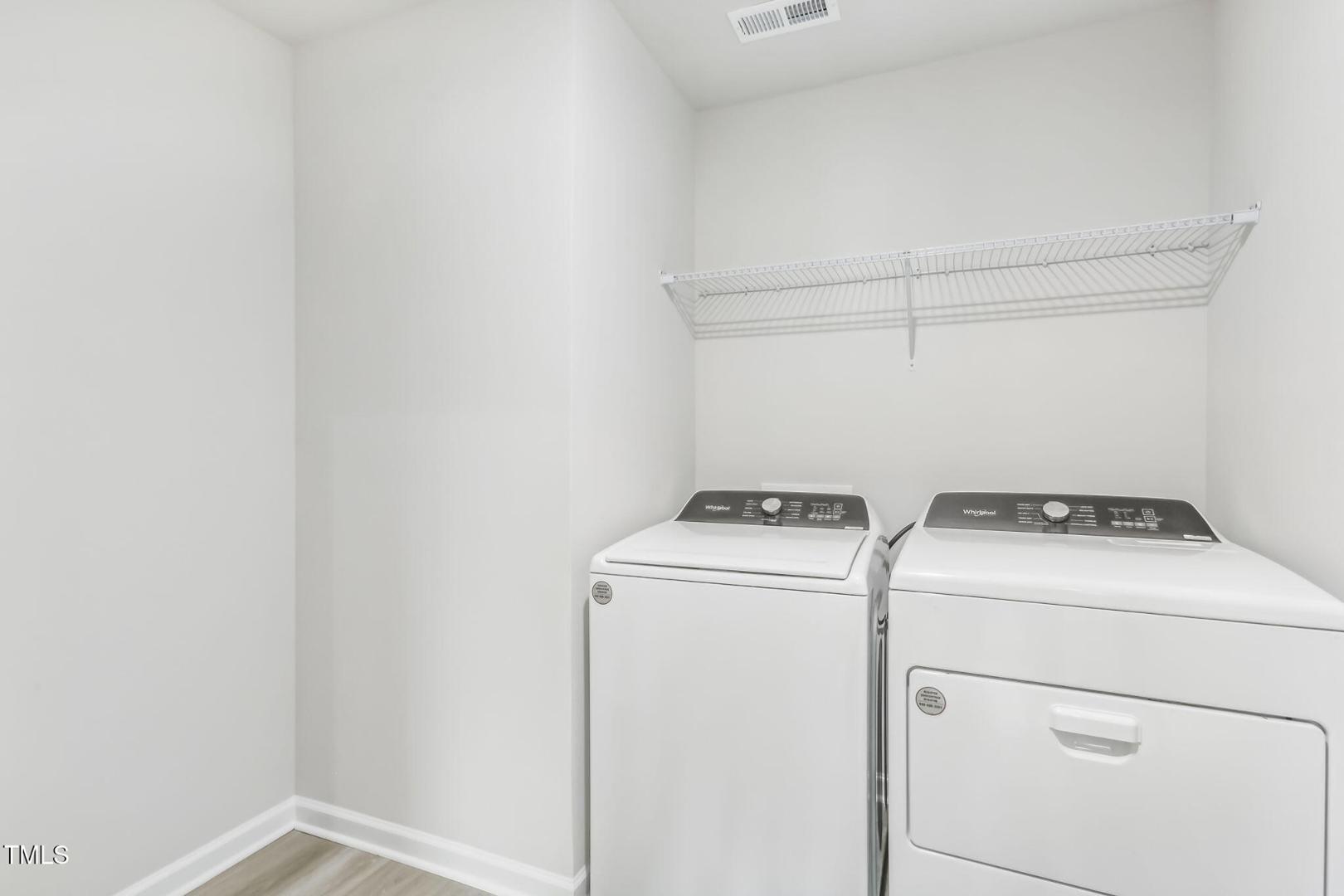191 White Birch Lane Angier, NC 27501 - Photo 12 of 35 a utility room with dryer and washer