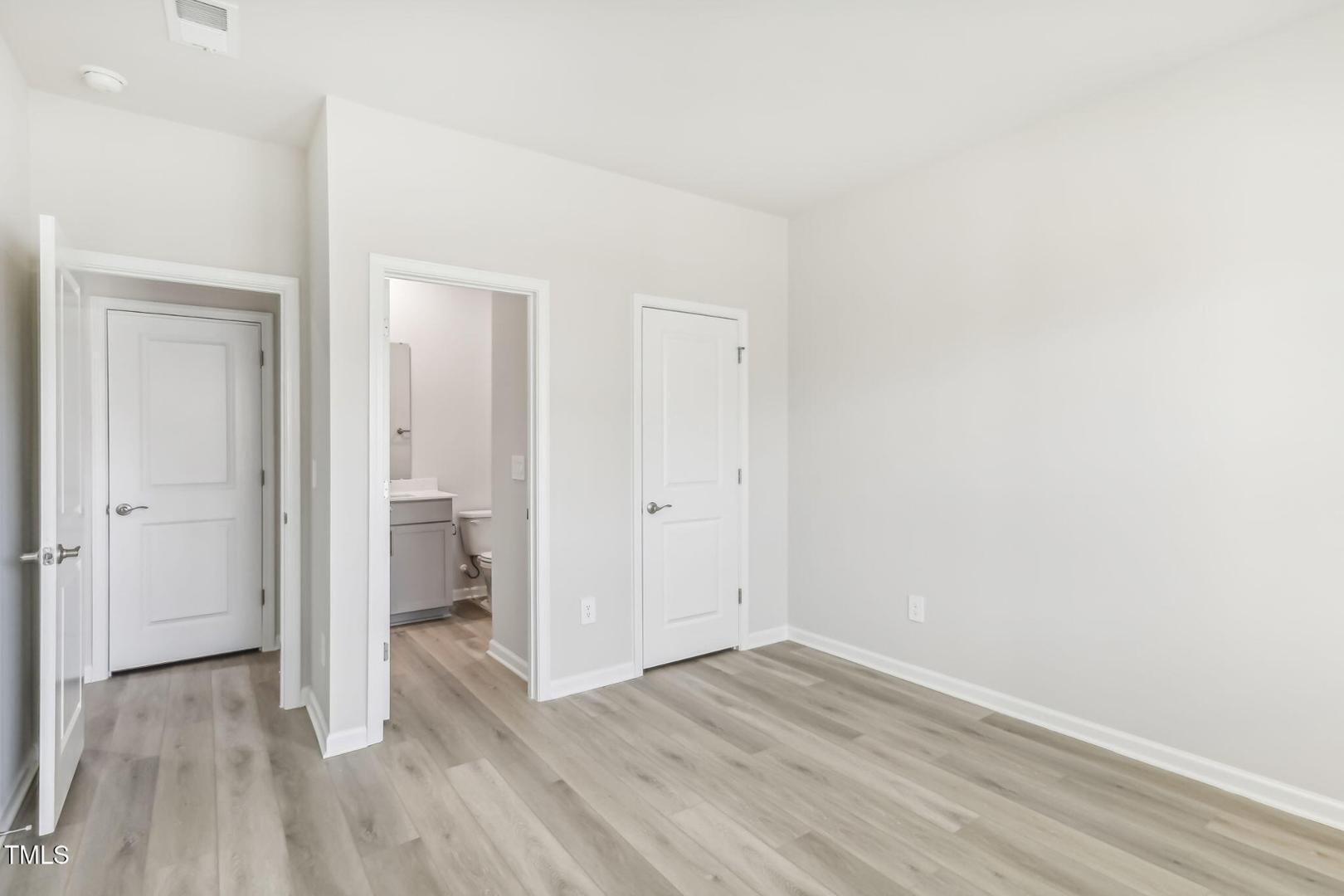 191 White Birch Lane Angier, NC 27501 - Photo 24 of 35 a view of a hallway with wooden floor