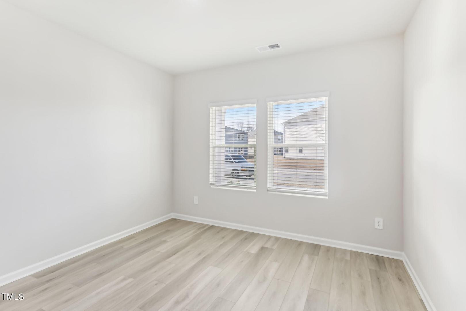 191 White Birch Lane Angier, NC 27501 - Photo 25 of 35 an empty room with a window