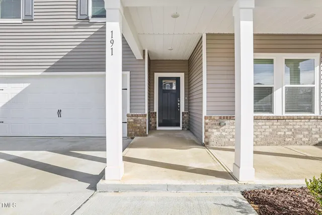 a view of entrance gate of house