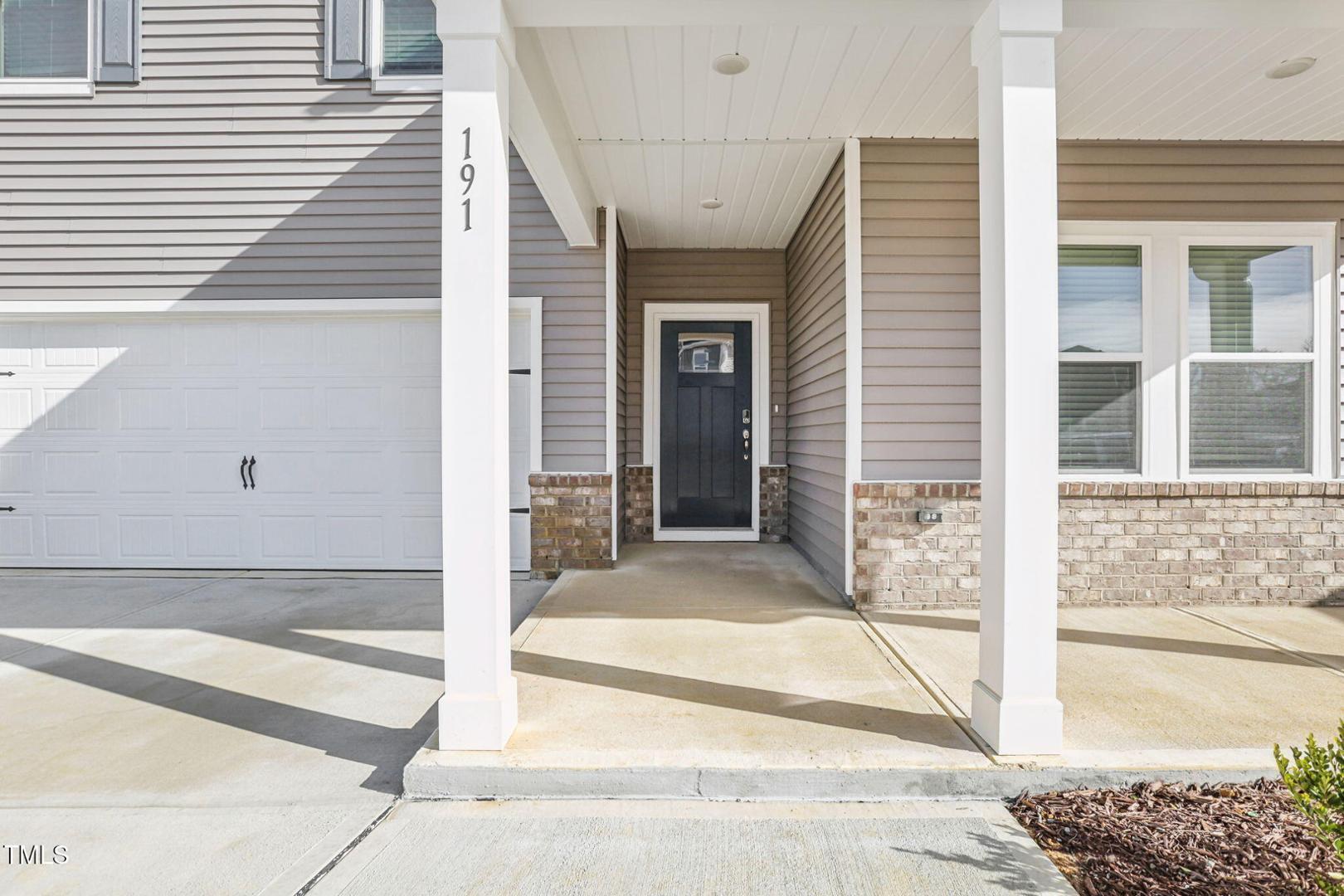 191 White Birch Lane Angier, NC 27501 - Photo 4 of 35 a view of entrance gate of house