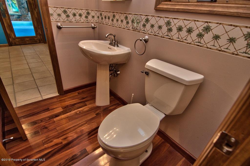 16 Pine Ridge Road Tunkhannock, PA 18657 - Photo 29 of 86 a bathroom with a toilet and sink