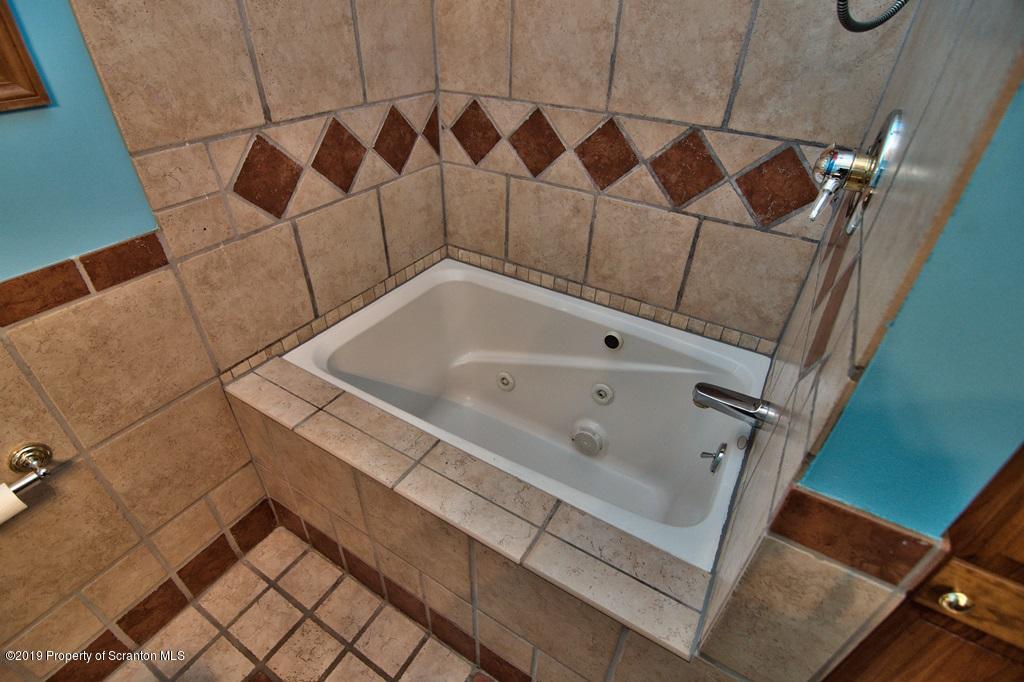 16 Pine Ridge Road Tunkhannock, PA 18657 - Photo 53 of 86 a bathroom with a bathtub