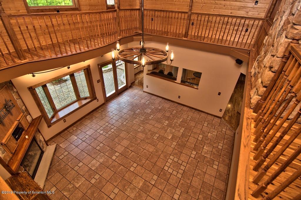 16 Pine Ridge Road Tunkhannock, PA 18657 - Photo 60 of 86 a view of a balcony with wooden floor