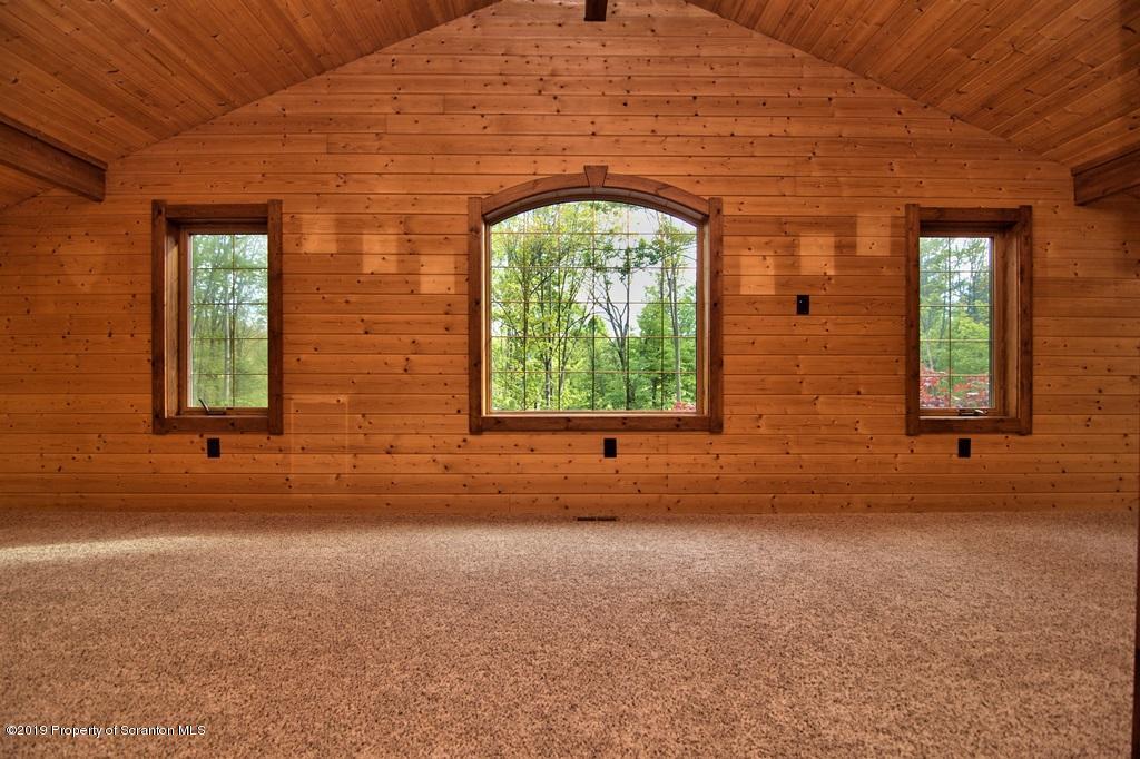 16 Pine Ridge Road Tunkhannock, PA 18657 - Photo 69 of 86 a view of an empty room with a window