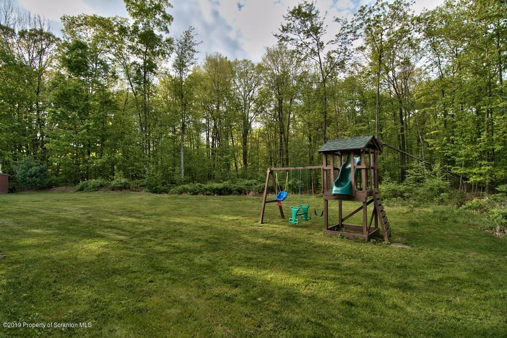 16 Pine Ridge Road Tunkhannock, PA 18657 - Photo 82 of 86 a view of park with swings
