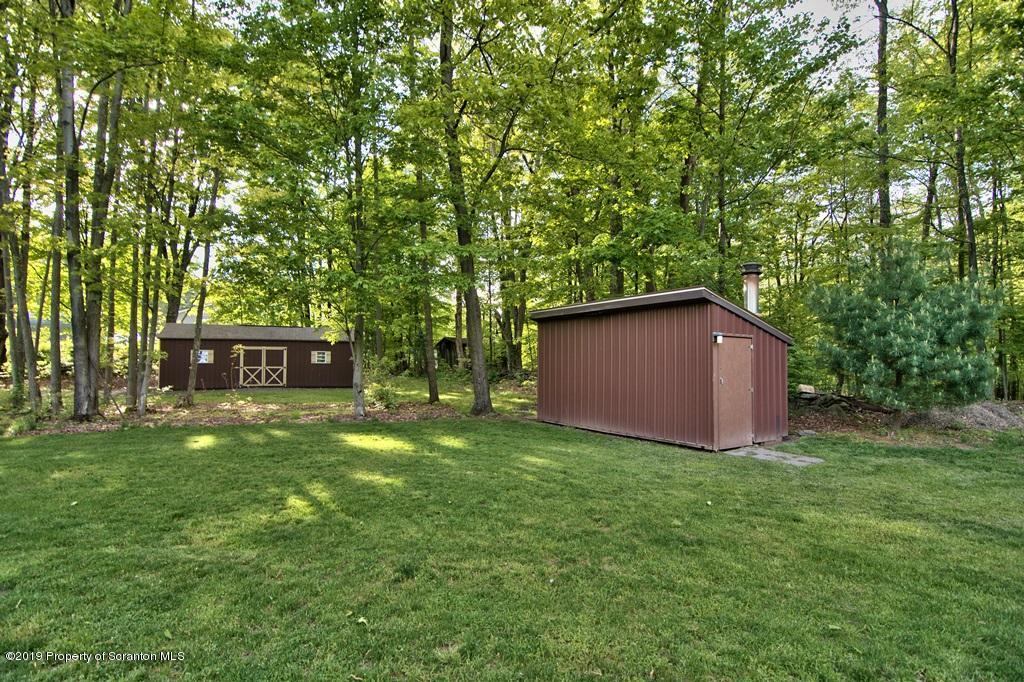 16 Pine Ridge Road Tunkhannock, PA 18657 - Photo 85 of 86 a view of a big yard with large trees