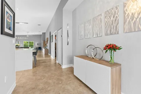 a view of a kitchen with a sink and dishwasher