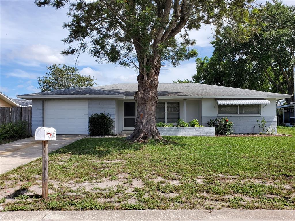 7809 Tropicana Drive Port Richey, FL 34668 - Photo 1 of 1 Front of home