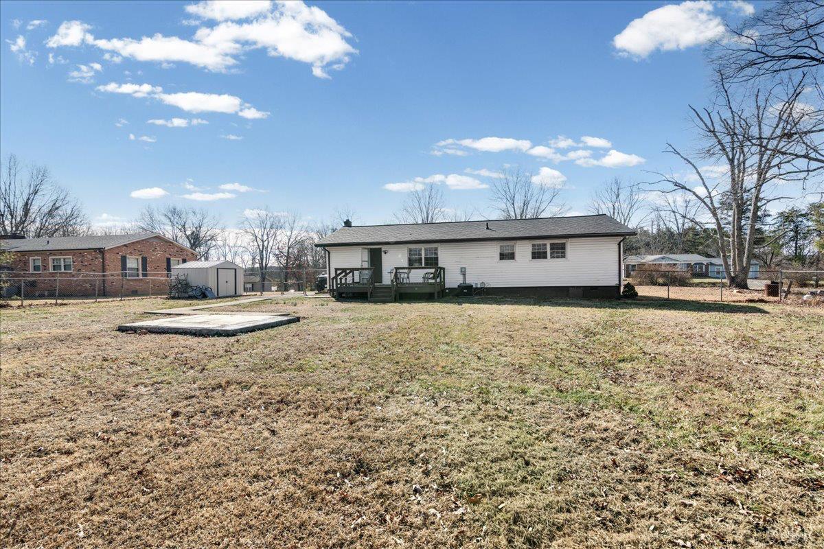 813 Doss Road Concord, VA 24538 - Photo 31 of 31 a view of house with yard and car parked