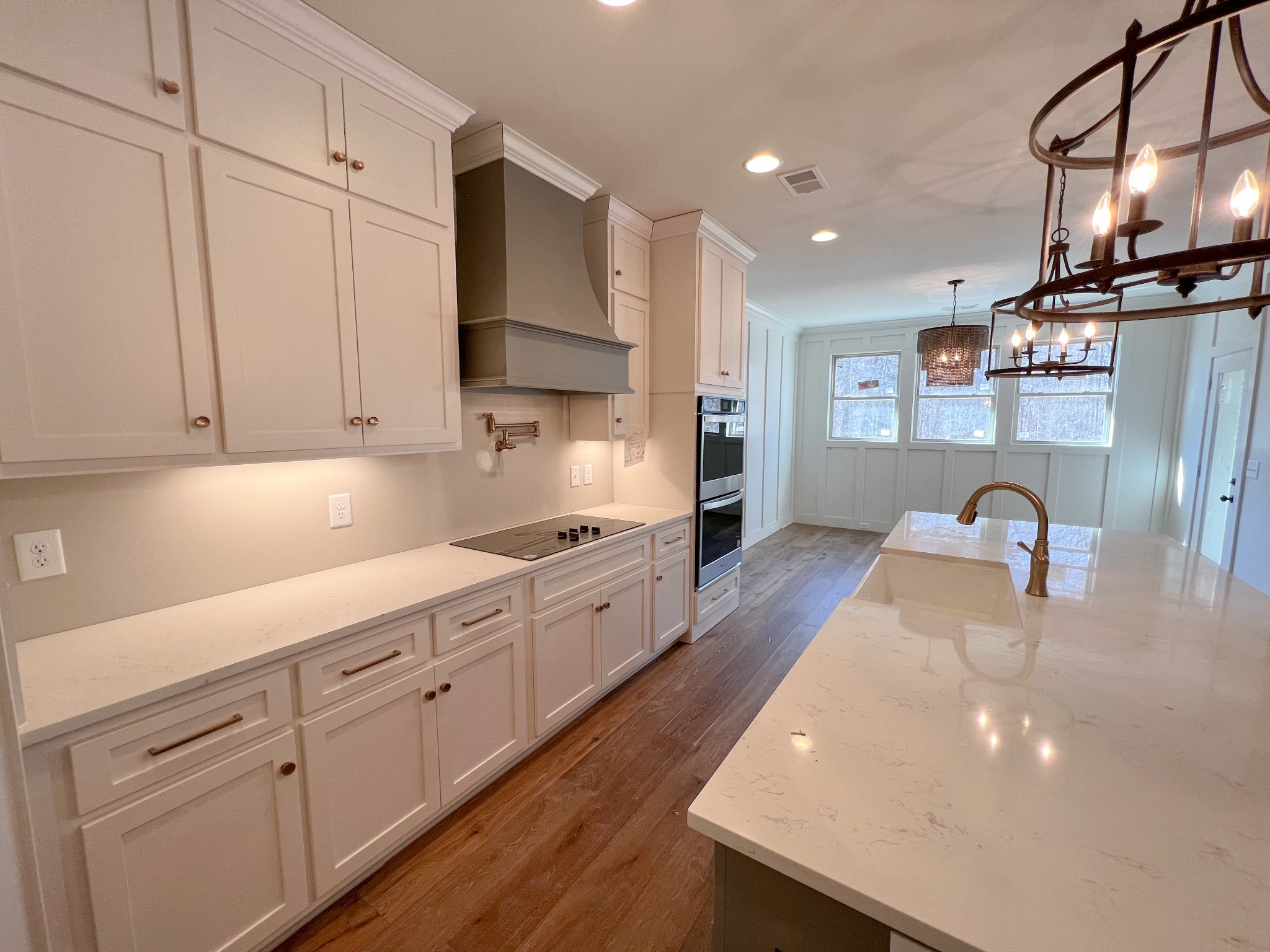 2000 Cairo Bend Road Lebanon, TN 37087 - Photo 14 of 35 a kitchen with stainless steel appliances granite countertop a sink a stove and a wooden floors