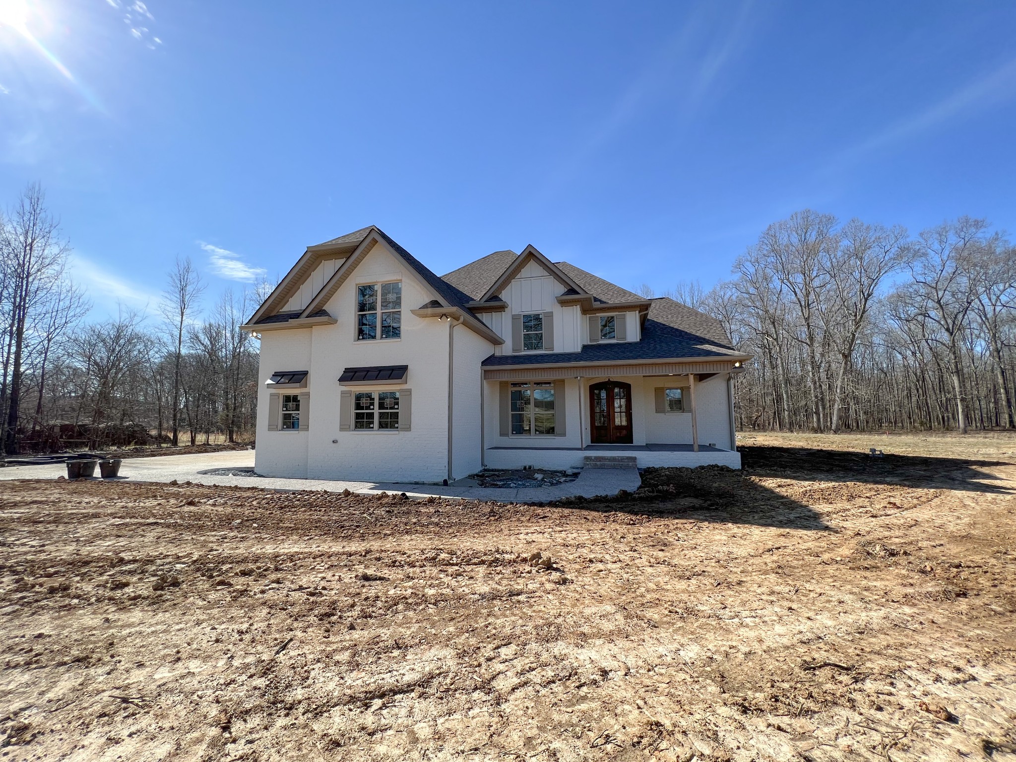 2000 Cairo Bend Road Lebanon, TN 37087 - Photo 2 of 35 a front view of a house with a yard