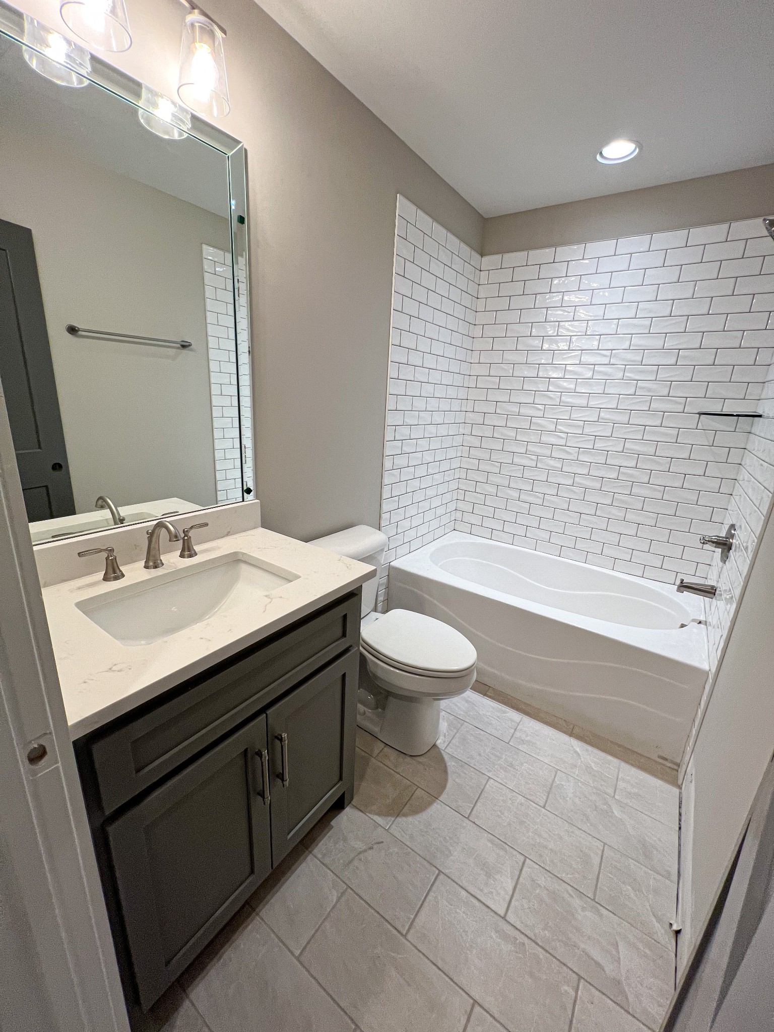 2000 Cairo Bend Road Lebanon, TN 37087 - Photo 29 of 35 a bathroom with a sink a toilet and bathtub