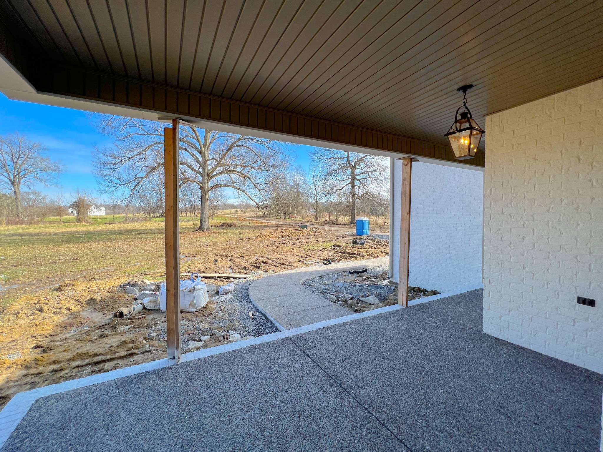 2000 Cairo Bend Road Lebanon, TN 37087 - Photo 6 of 35 a view of a livingroom with wooden floor and door