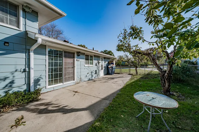 a house view with a garden space